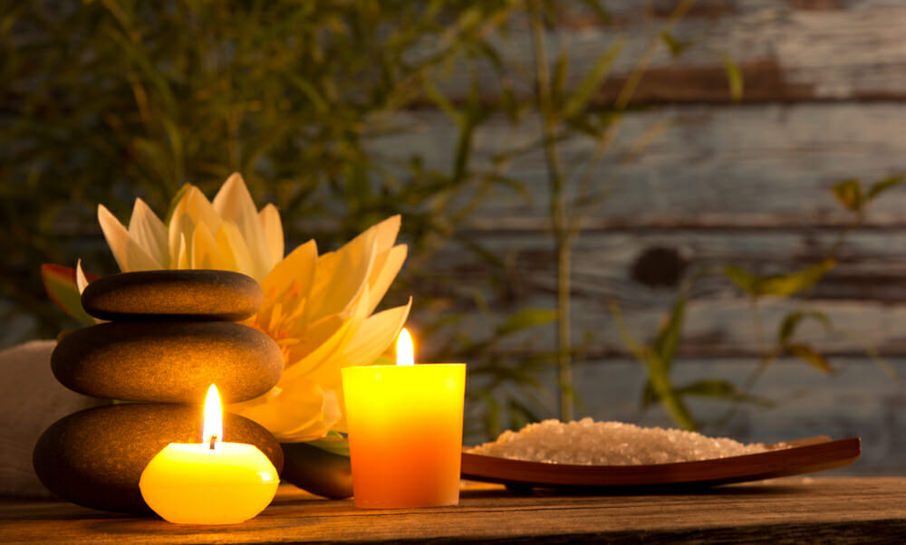 Relaxing candles can be one way to practice quiet self-care