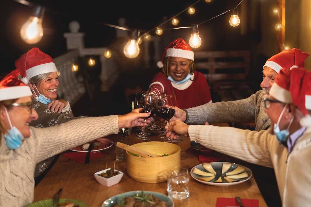 Family Members celebrating the holidays outdoors together