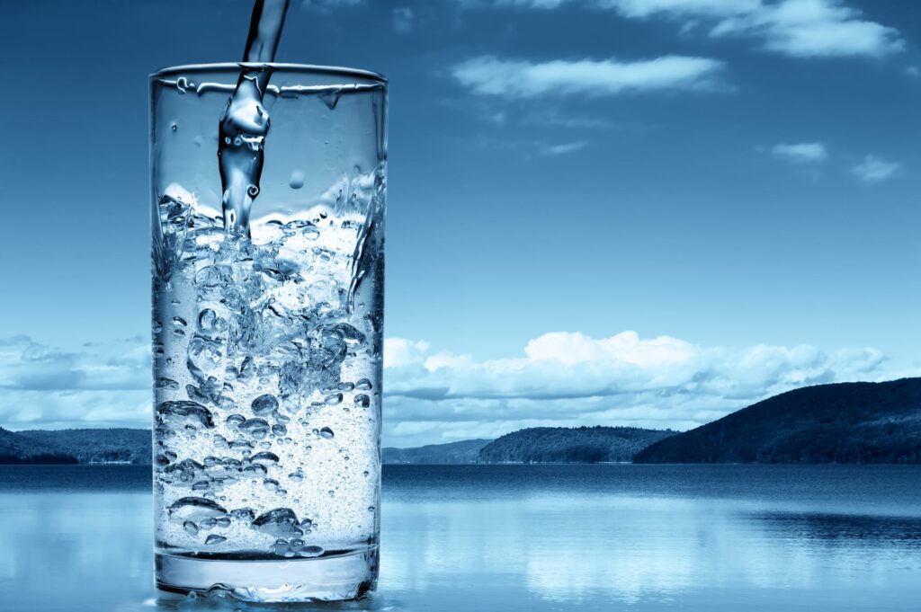 Water pouring into a glass - showing the importance of hydration